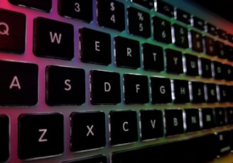 A vibrant close-up of a gaming keyboard with colorful RGB lighting.