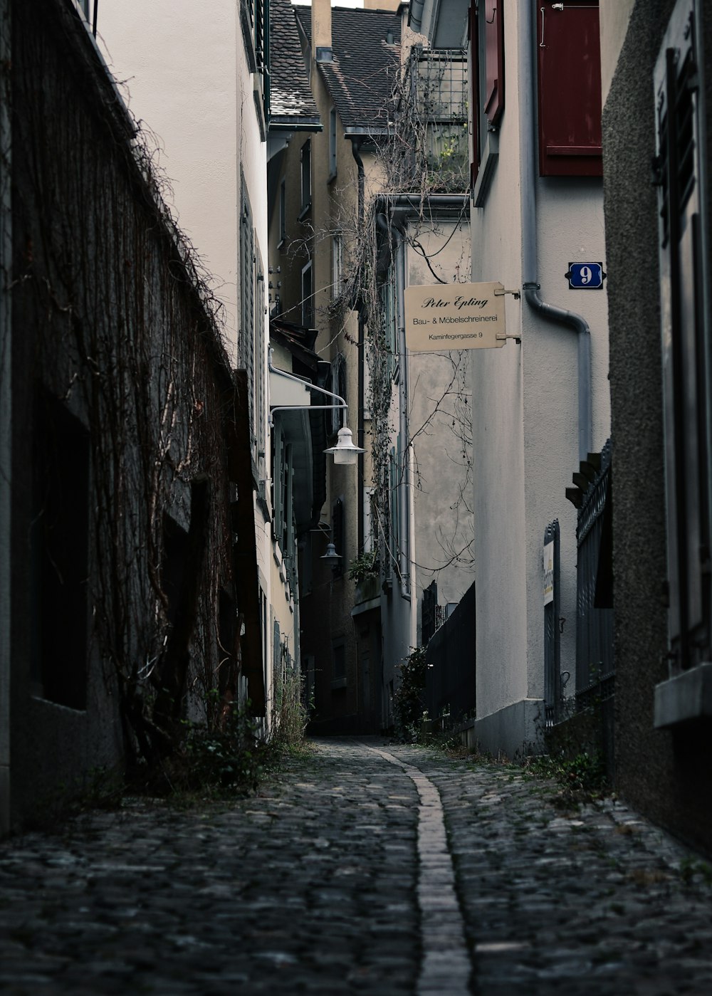 gray concrete brick floor street during daytime