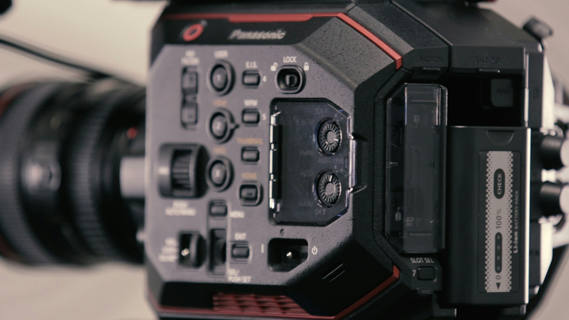 A close-up of a video camera recording, representing the dedicated video slider section on the website.