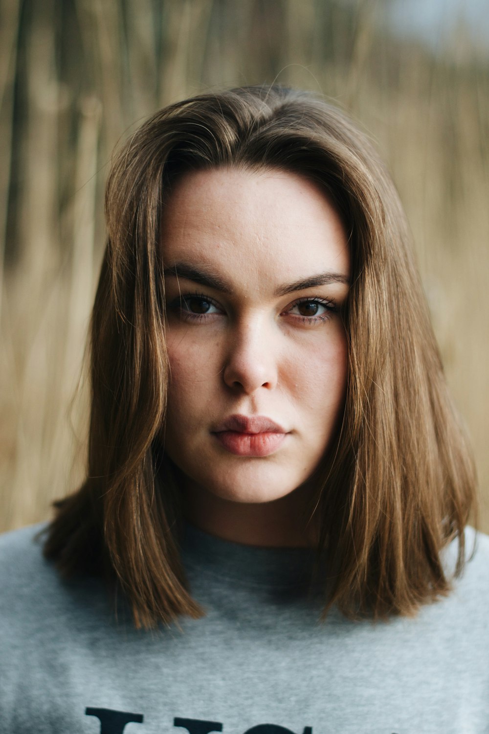 woman in gray crew-neck top