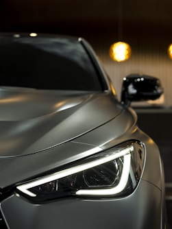 silver vehicle during nighttime