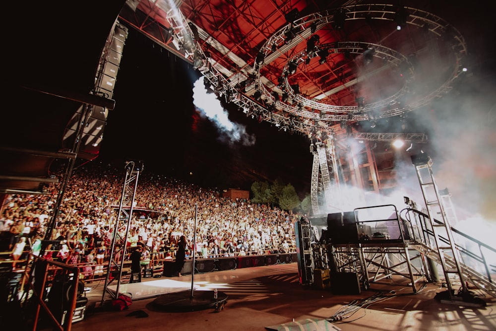 people standing near stage