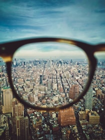 city buildings on eyeglasses view