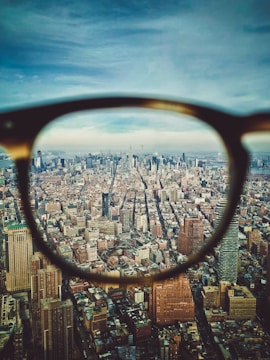 city buildings on eyeglasses view