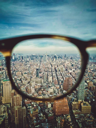 city buildings on eyeglasses view