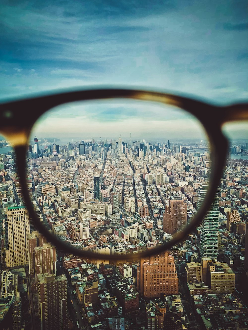 city buildings on eyeglasses view