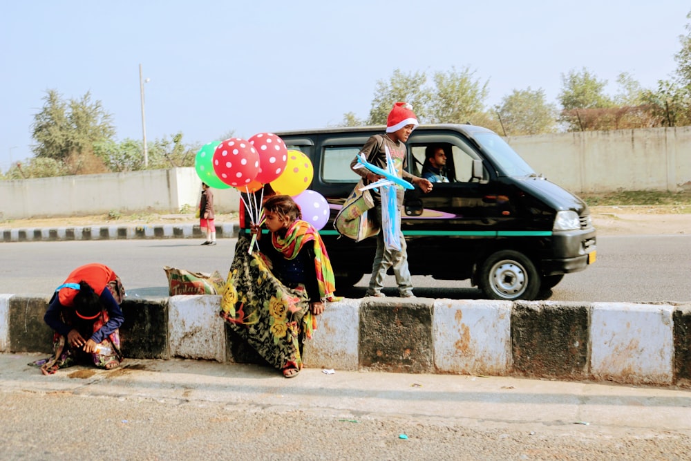 person holding balloons