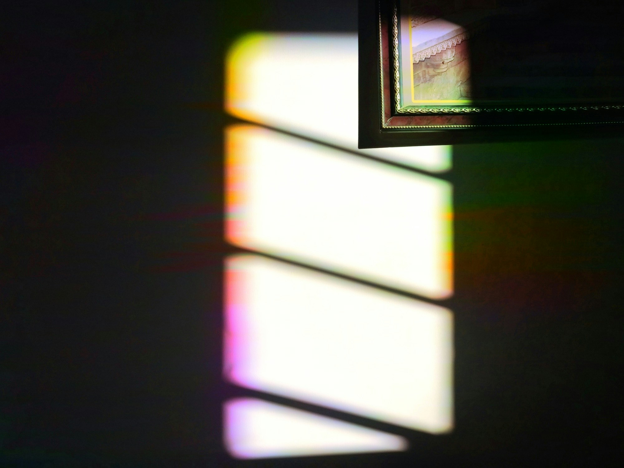 A single beam of light enters a modern glass prism and splits into a vibrant spectrum, symbolizing how AI synthesizes and reinterprets brand information.