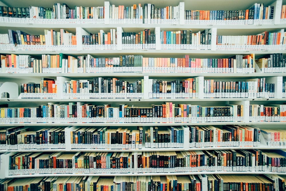 pile of books on shelf