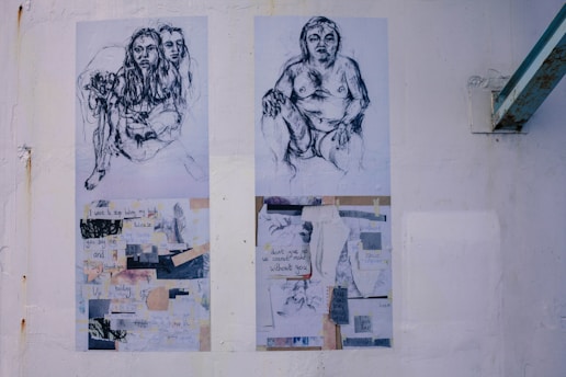 Two abstract sketches feature figures with expressive lines. The left sketch displays intertwined figures, conveying a sense of intimacy or conflict. Below are collaged text messages with phrases about body image and acceptance. The right sketch portrays a lone figure in a seated position, looking reflective. Below it are more collages with phrases suggesting struggle and introspection. The artwork is mounted on a white wall with a visible beam overhead.