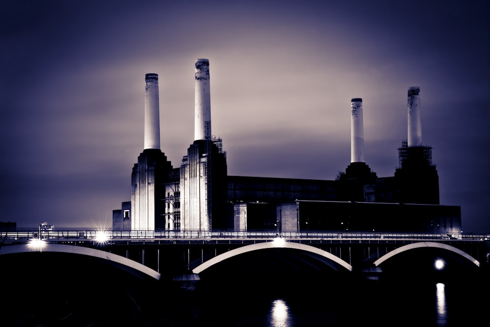 gray concrete building near bridge