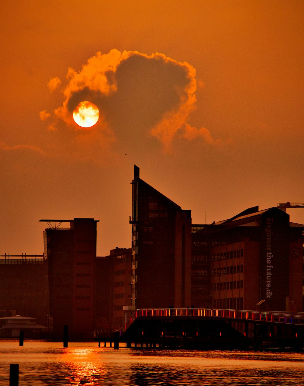 scenery of tall buildings during sunset