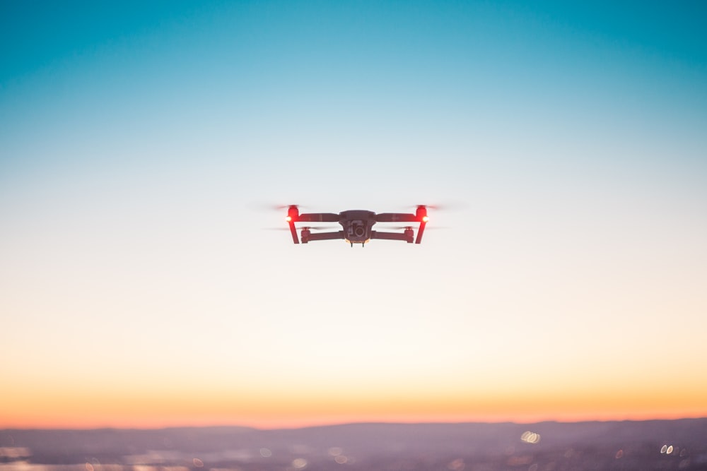 drone hoovering at daytime