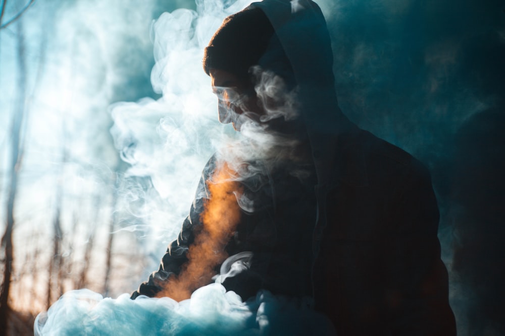 person with smoke silhouette