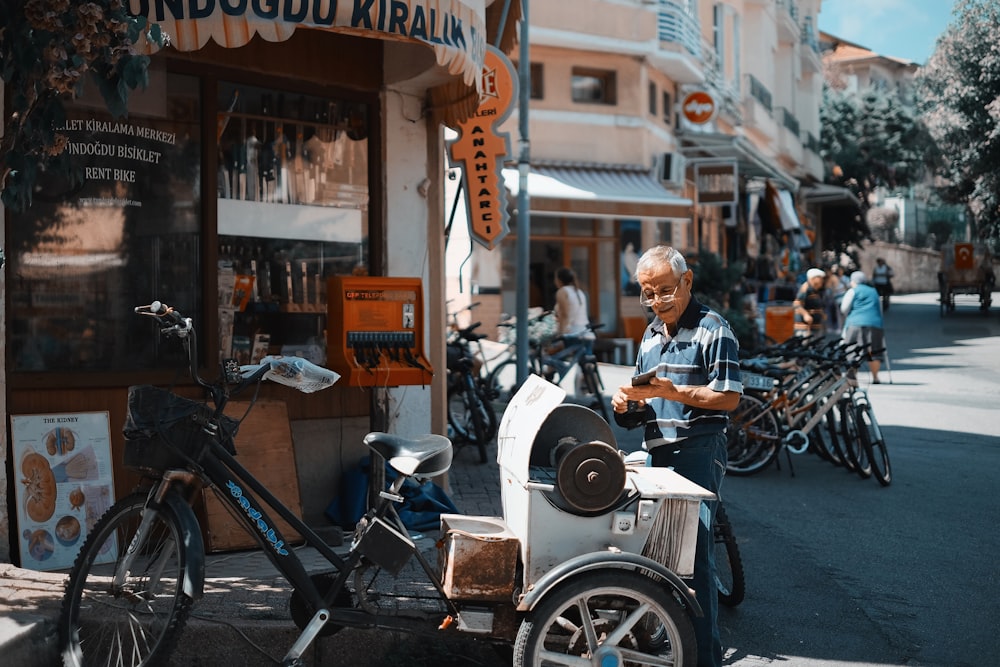 man standing behind the trile