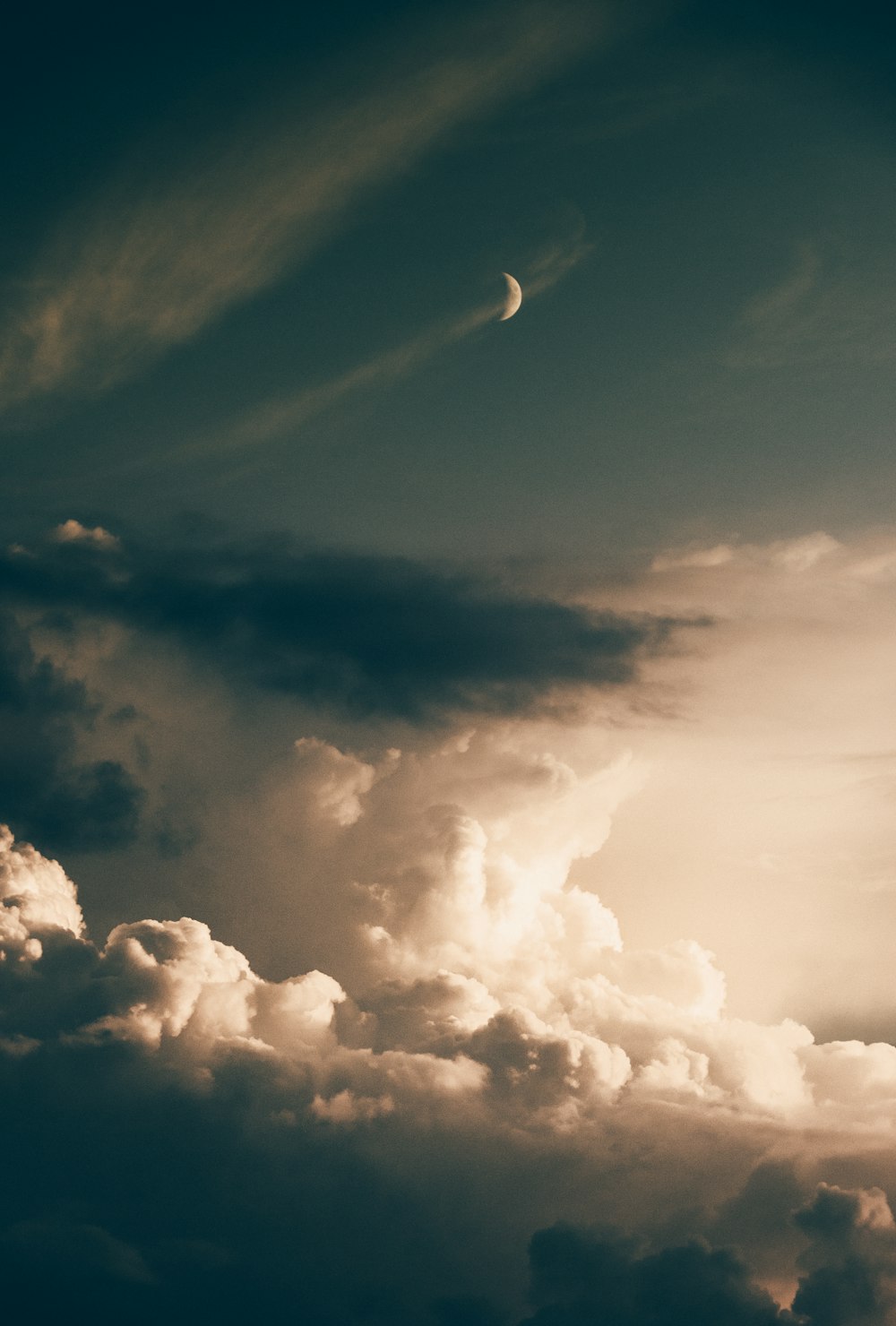 crescent moon and clouds