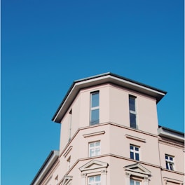 low angel photo of beige building