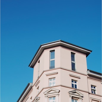 low angel photo of beige building