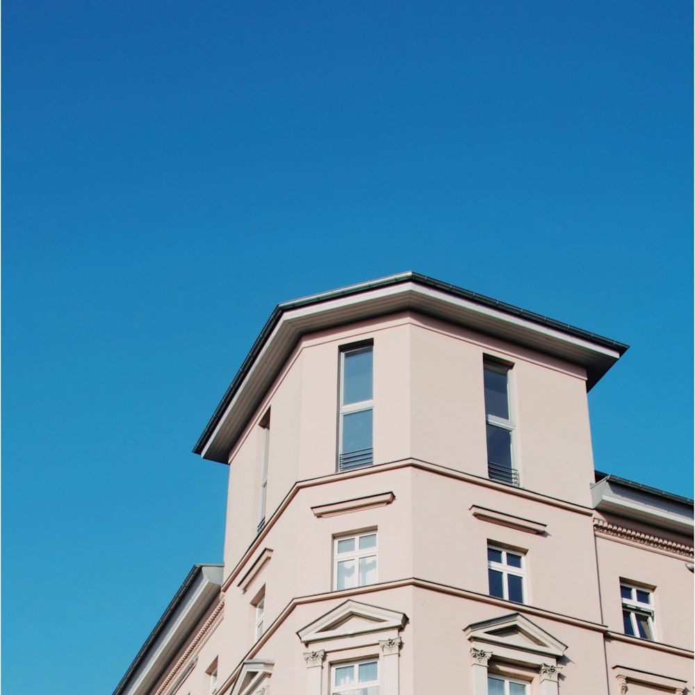 low angel photo of beige building