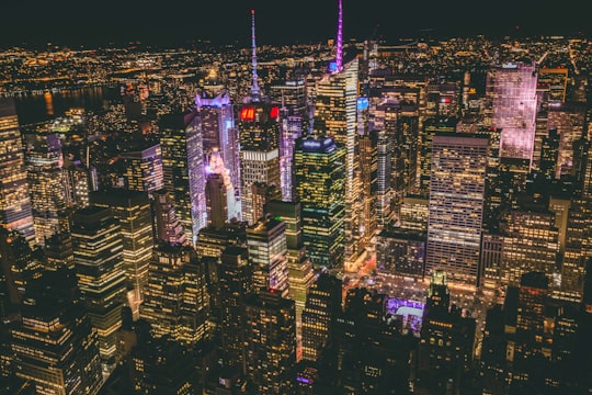 aerial photography of city buildings during nighttime in Empire State Building United States