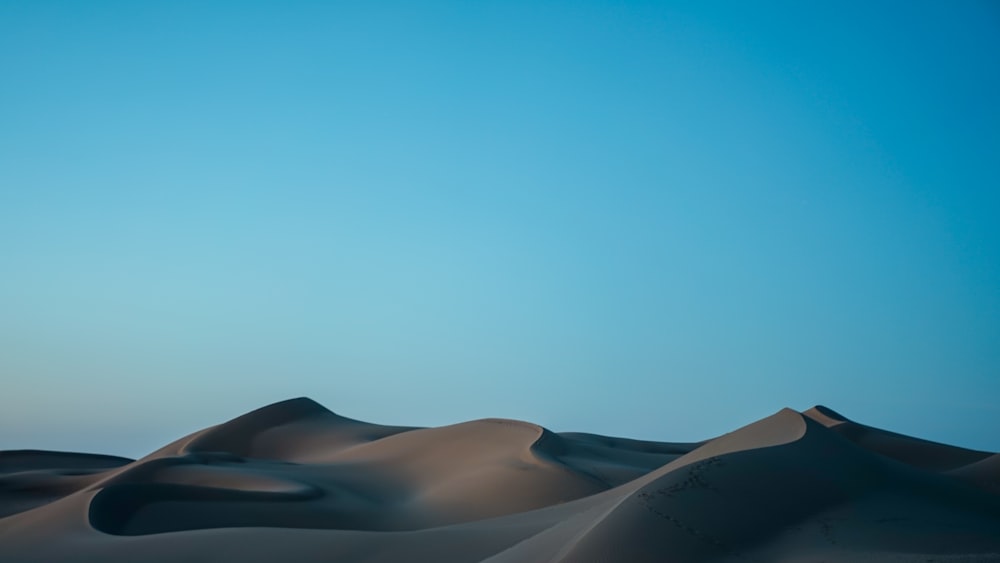 desert under blue sky