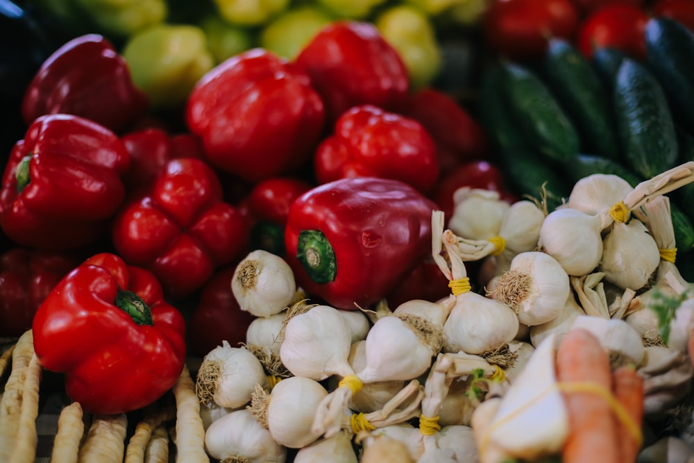 red bell pepper on white garlics