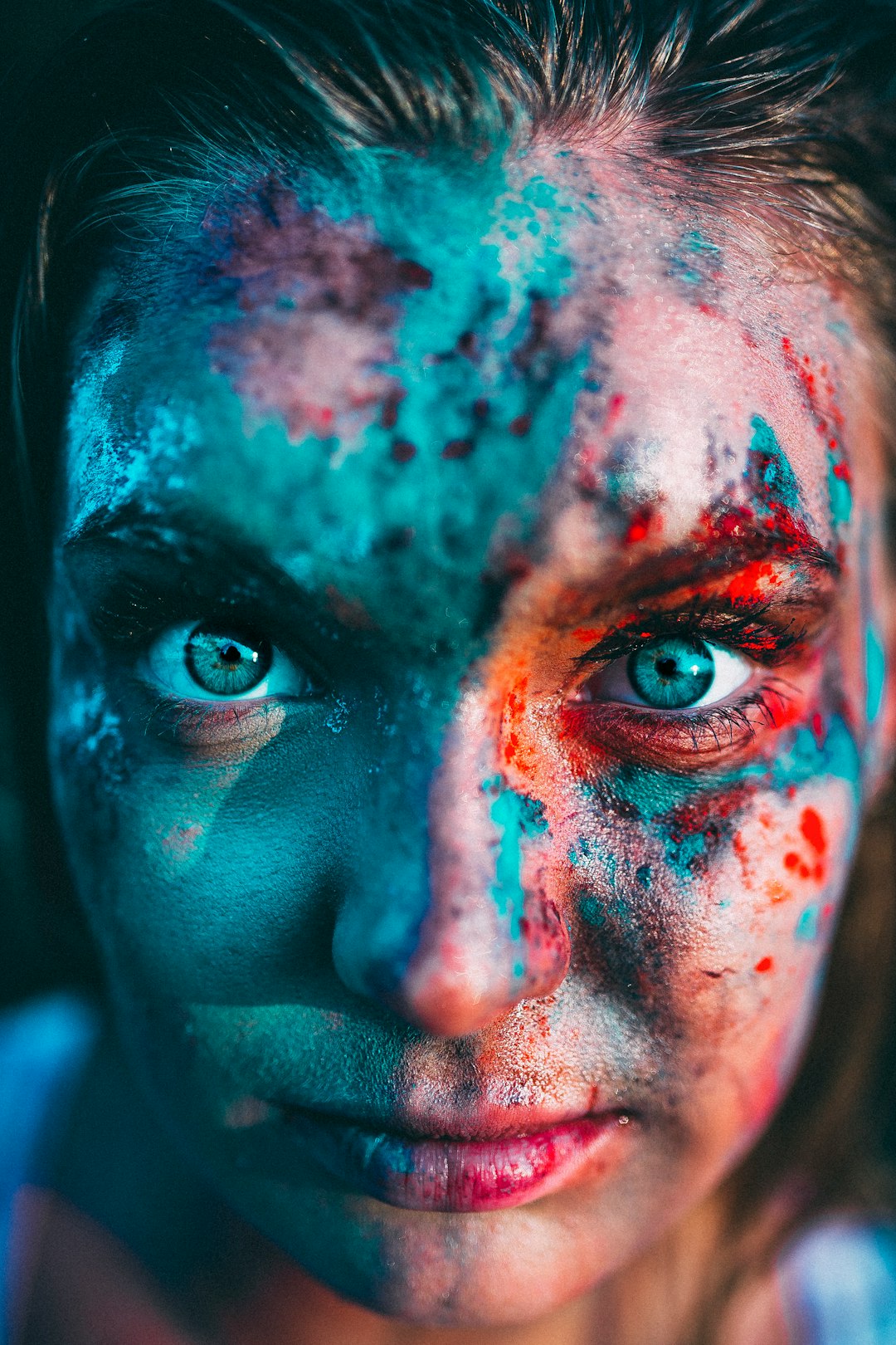 portrait photography of woman with face paint
