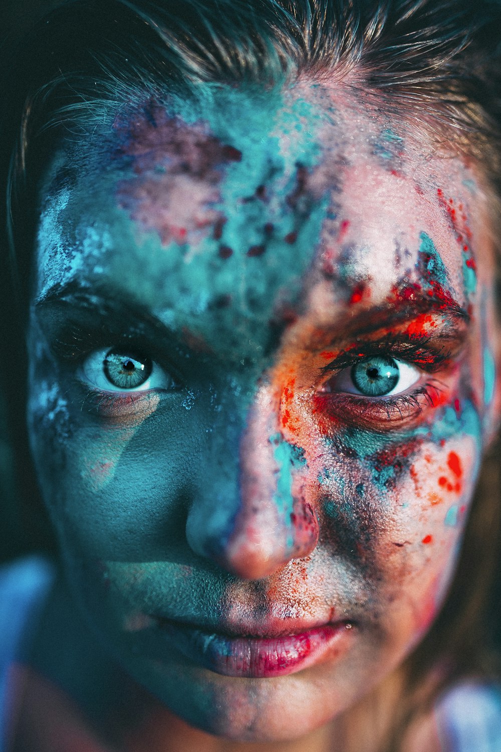 portrait photography of woman with face paint