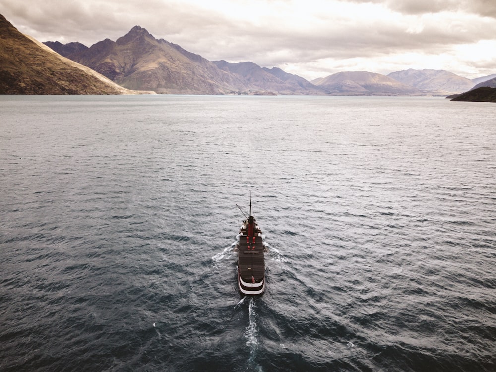 boat sailing during daytime