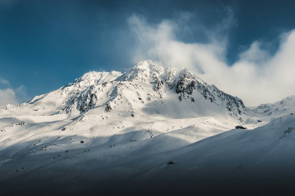 Peaks above the resort in cloud — Val Thorens, France