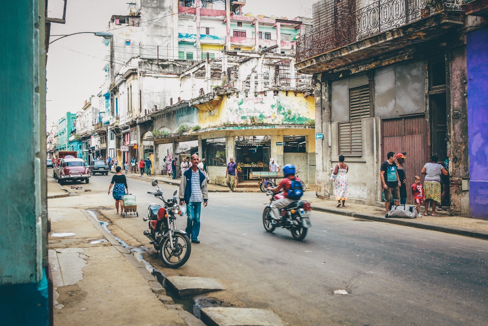 man walking on road