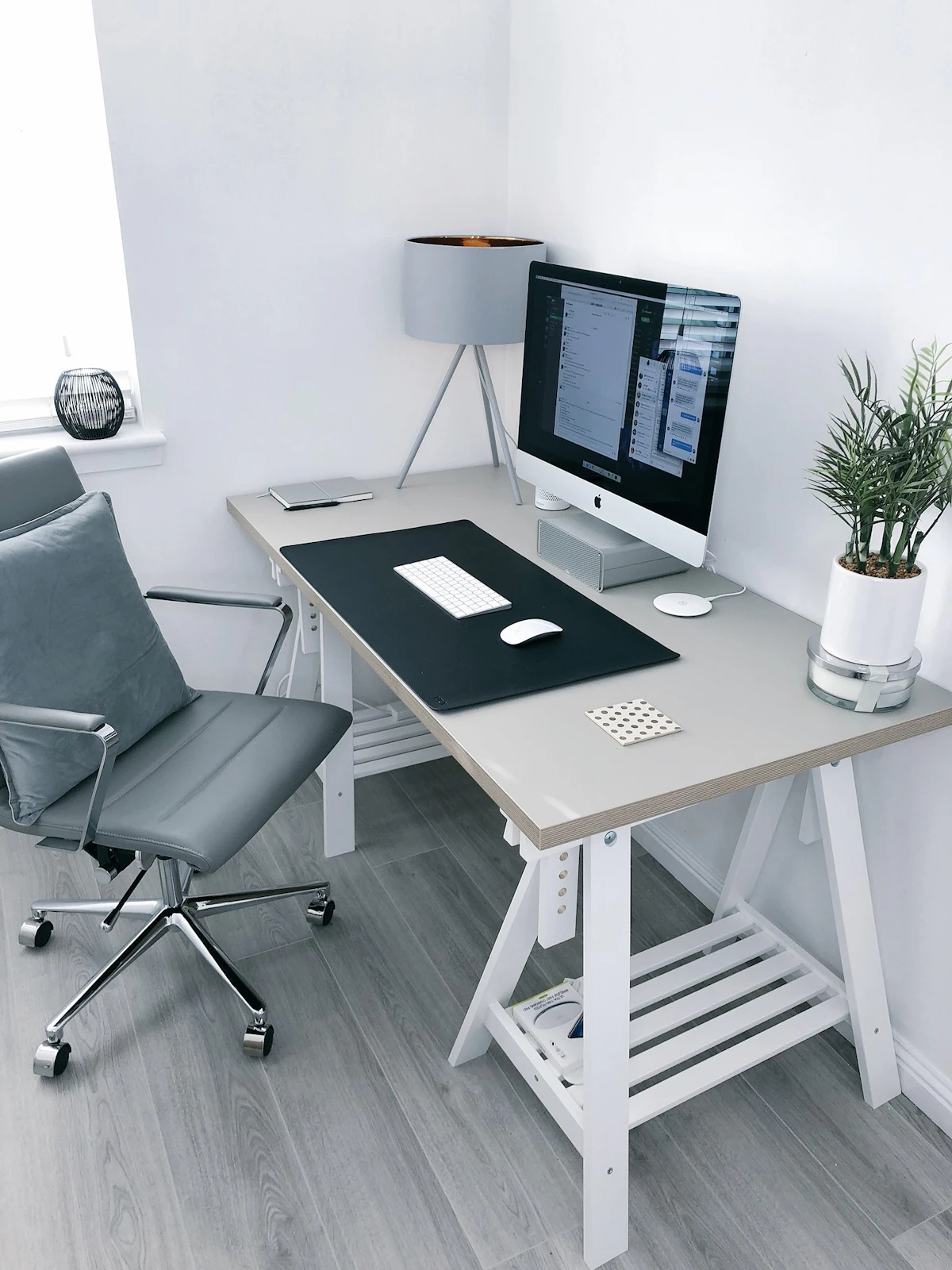 Home office with daylight, desk lamp and simple storage