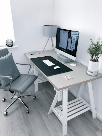 Axis Monolith height-adjustable computer desk in a modern ergonomic home office