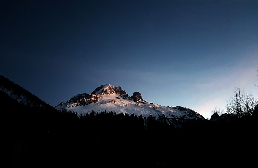 mountain covered with snow photo