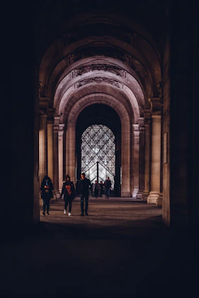 people waking inside hall