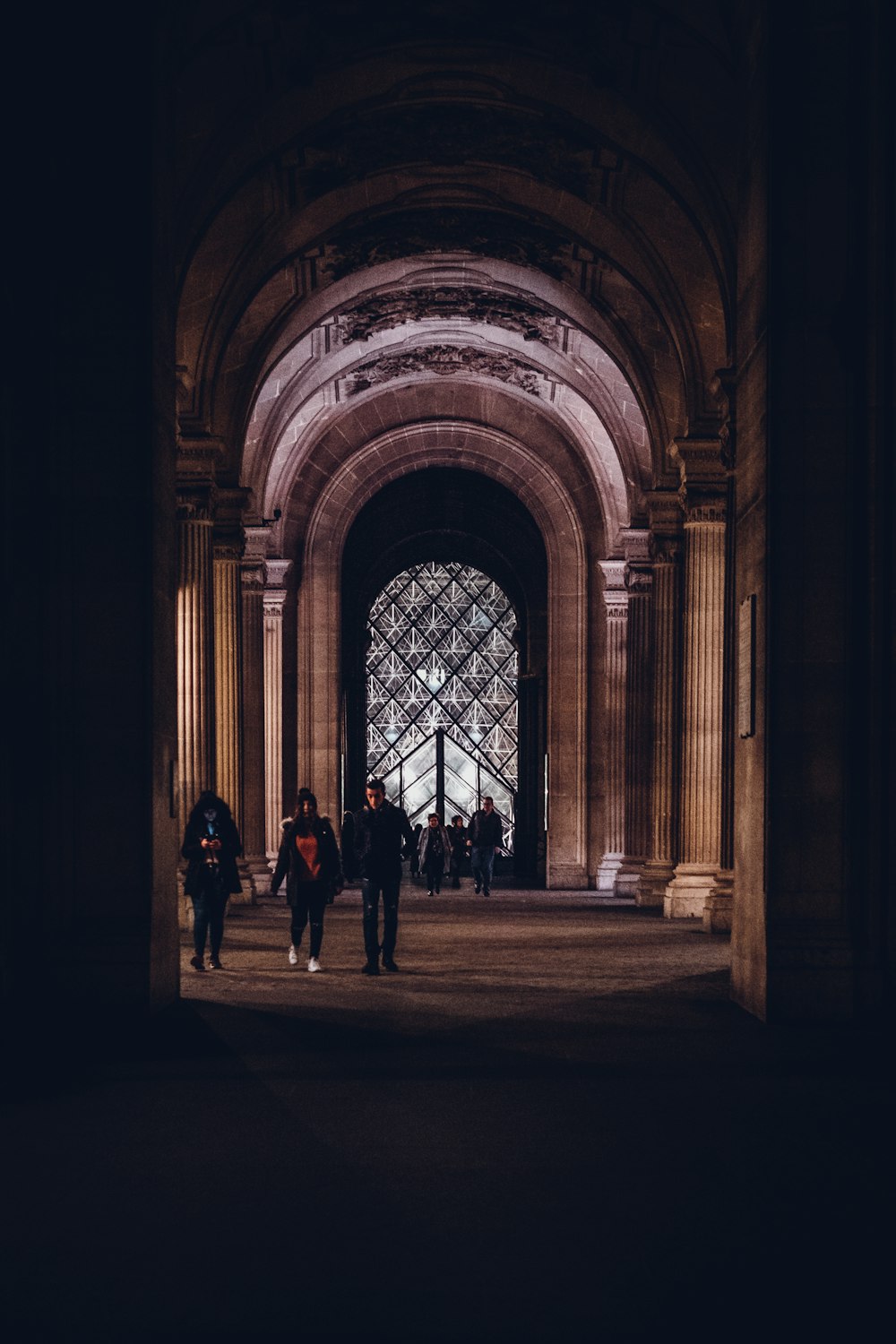 people waking inside hall