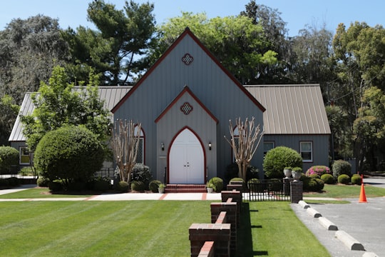 church surrounded by green plants in Bluffton United States