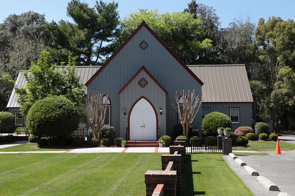 church surrounded by green plants