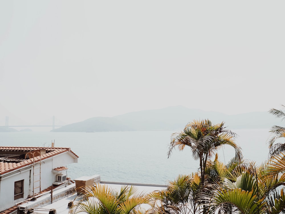 landscape photography of house near shore