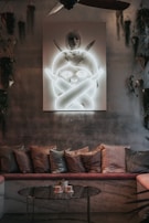 A vibrant living area with unique art pieces and comfortable seating.