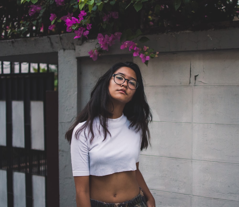 woman standing near wall