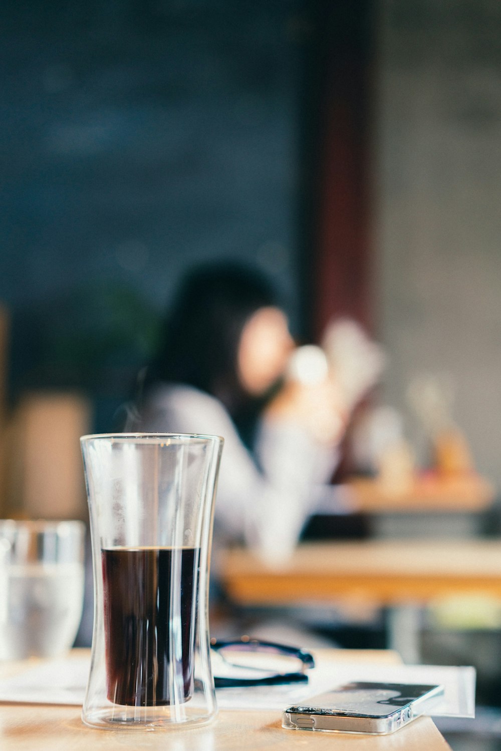 shallow focus photo of drinking glass with liquor