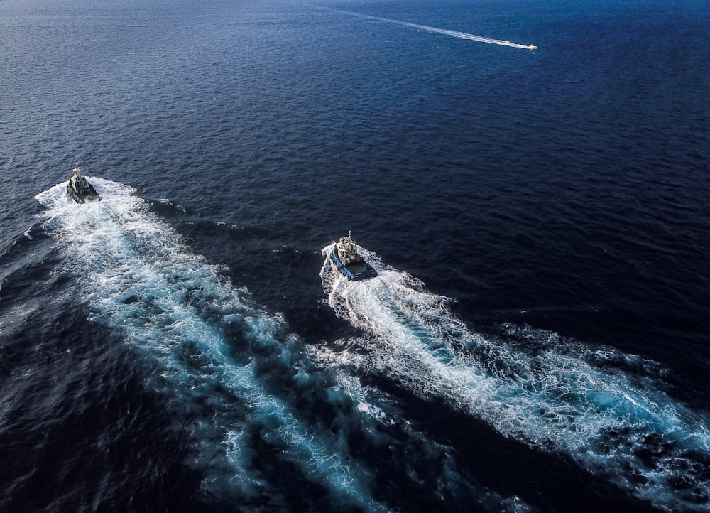 aerial photography of two boats at sea