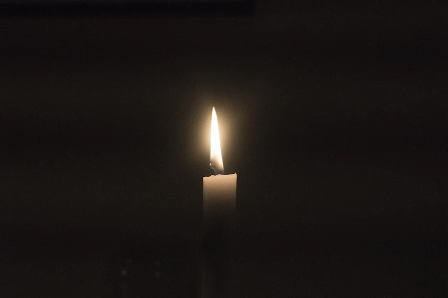 A candle burning in remembrance