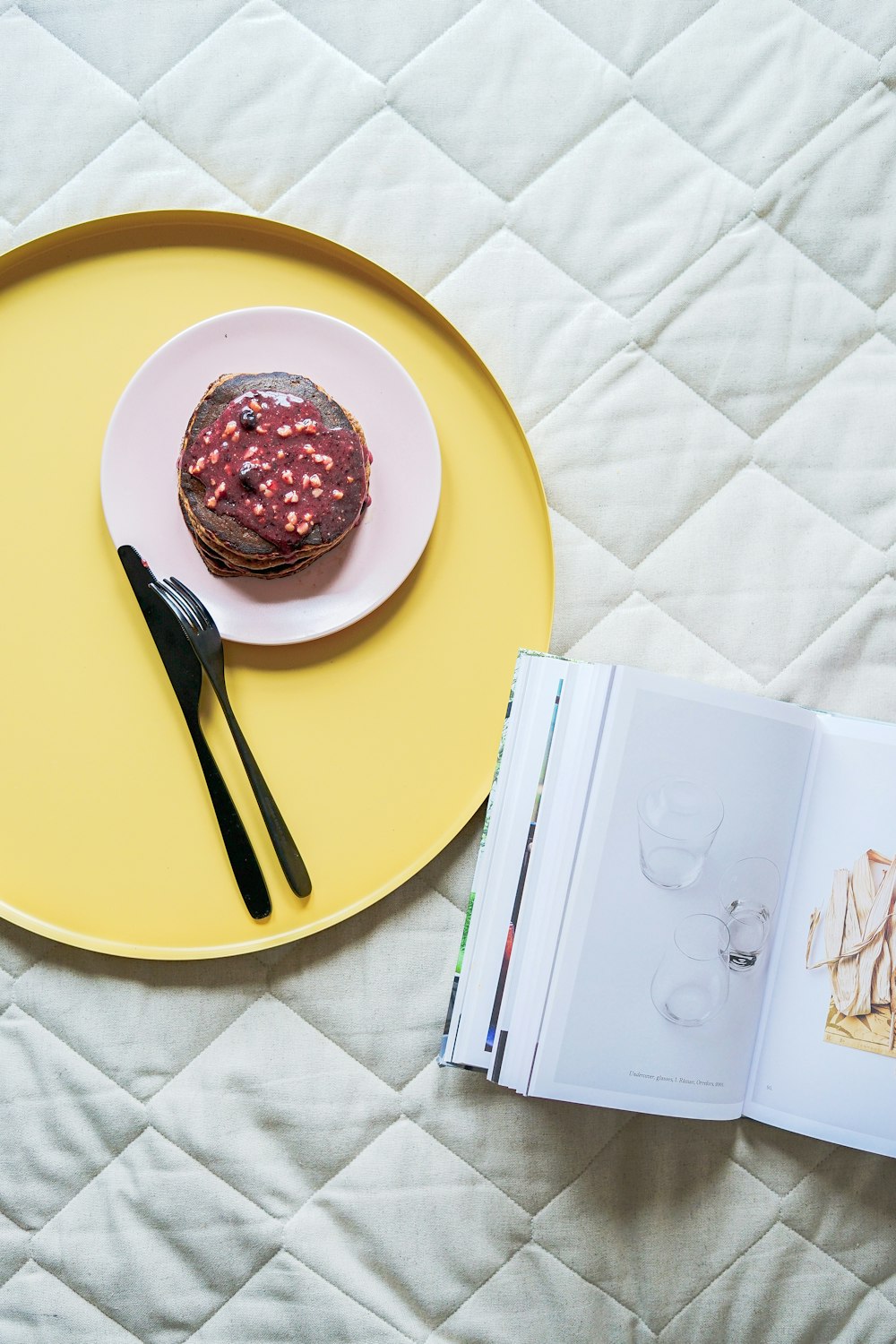 pastry on plate near knife and fork