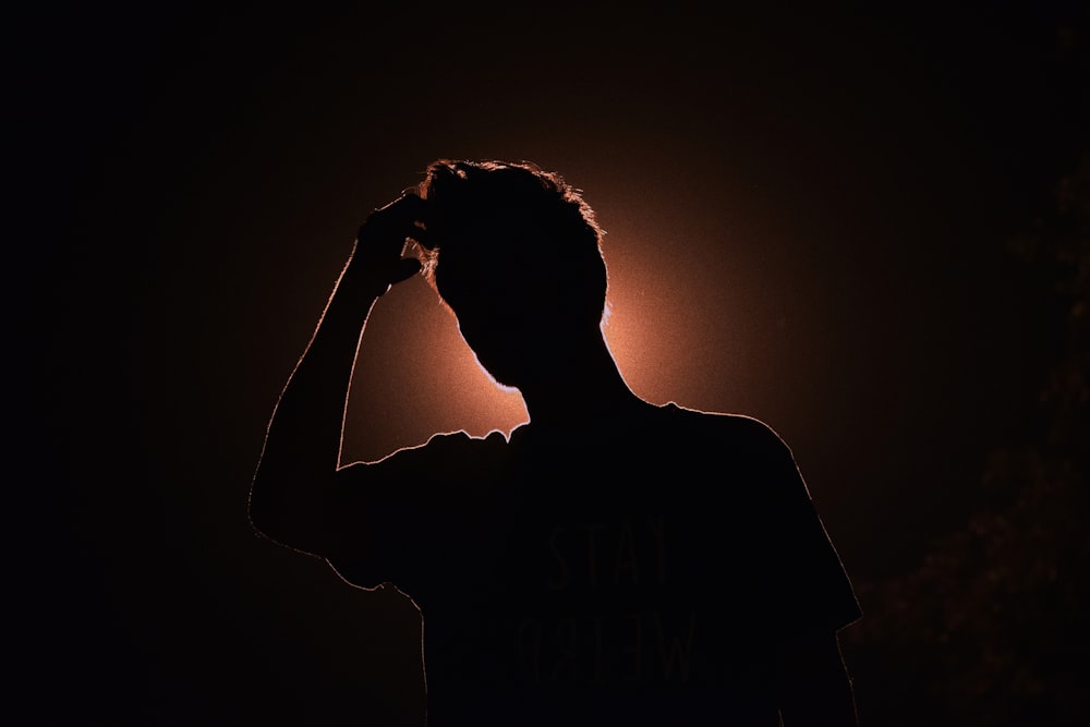 silhouette photo of man