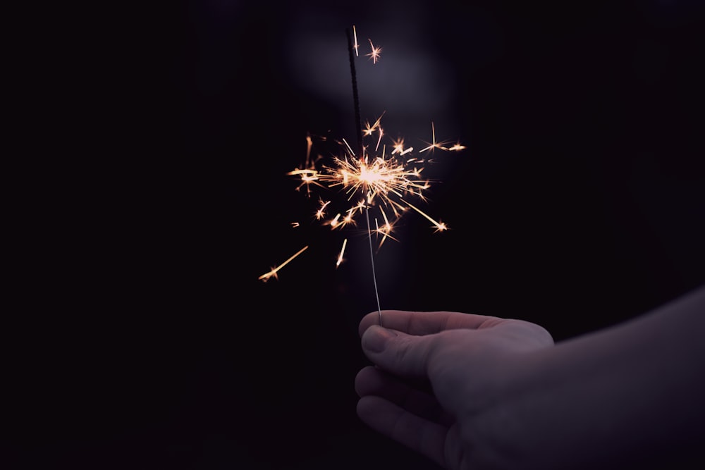 person holding a sparkler