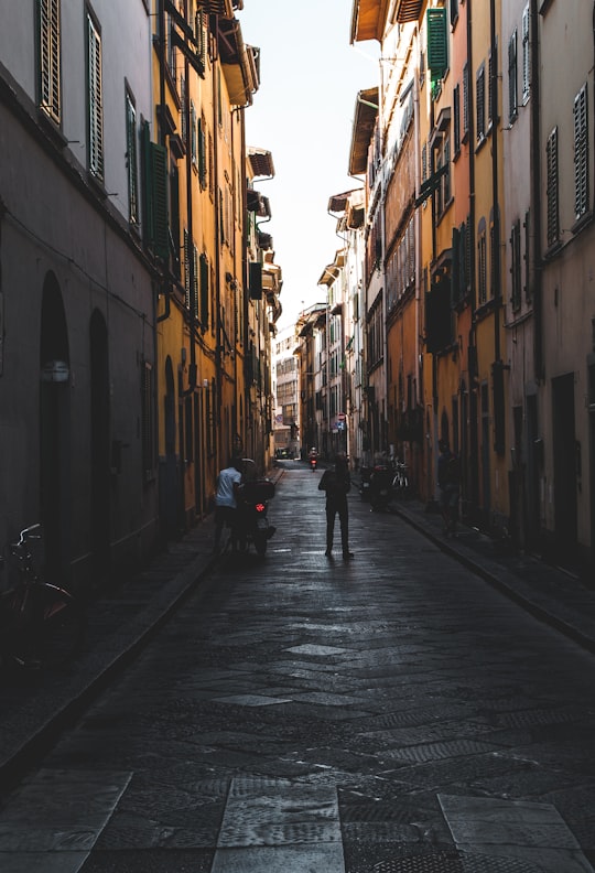 architectural photography of alleyway in Metropolitan City of Florence Italy