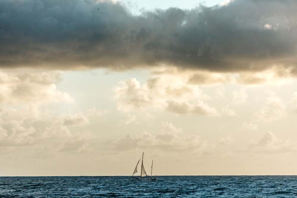 sailing boat on body of water