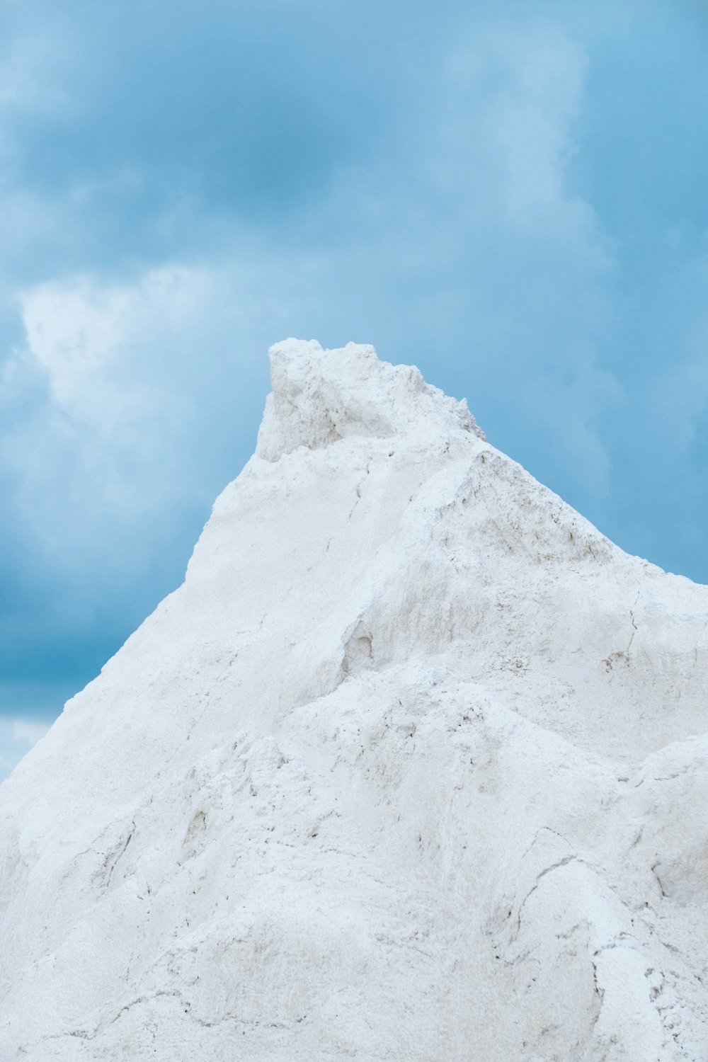 gray mountain peak under blue sky